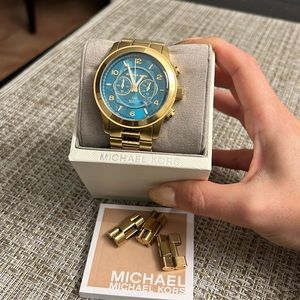 Michael Kors stop hunger watch. Slightly worn.